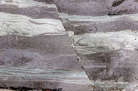 Eroded Sea-stack base - evidence of two inch seismic shift